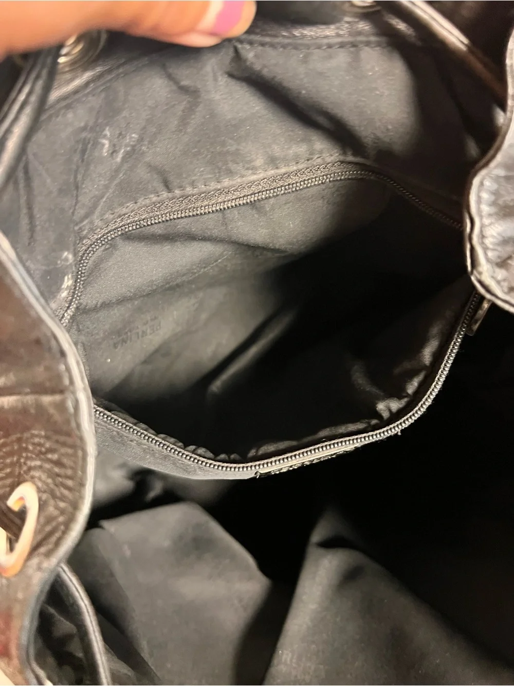 Perlina Black Leather Drawstring Flap Backpack